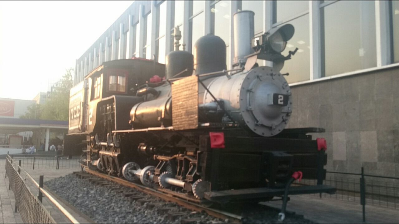 train - vehicle, transportation, railroad track, rail transportation, steam train, locomotive, mode of transport, day, outdoors, old-fashioned, no people, sky