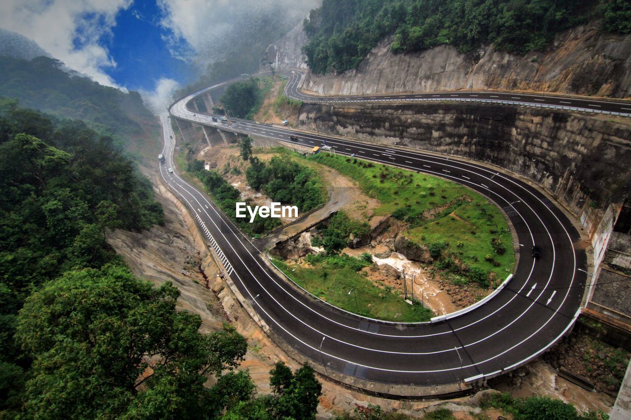 High angle view of road amidst trees