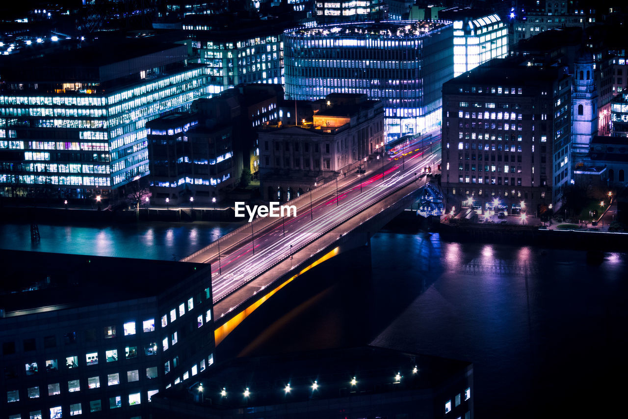 High angle view of light trails on city at night