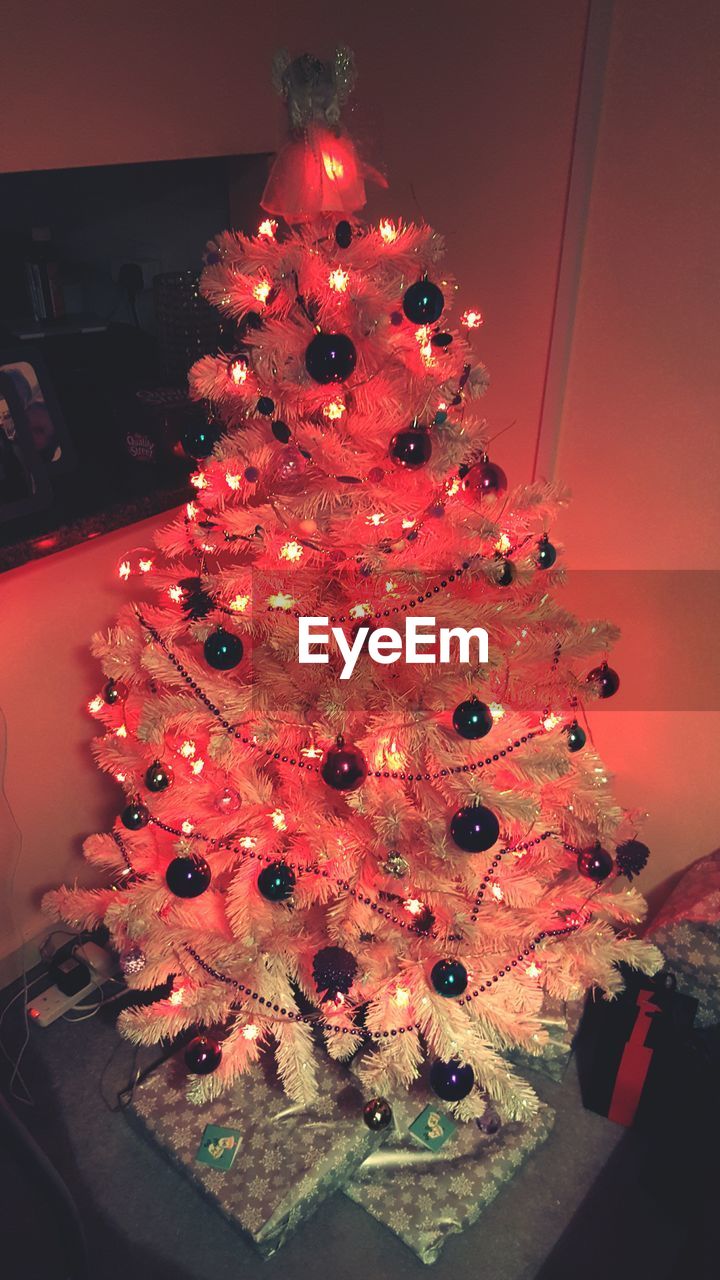 High angle view of illuminated christmas tree at home