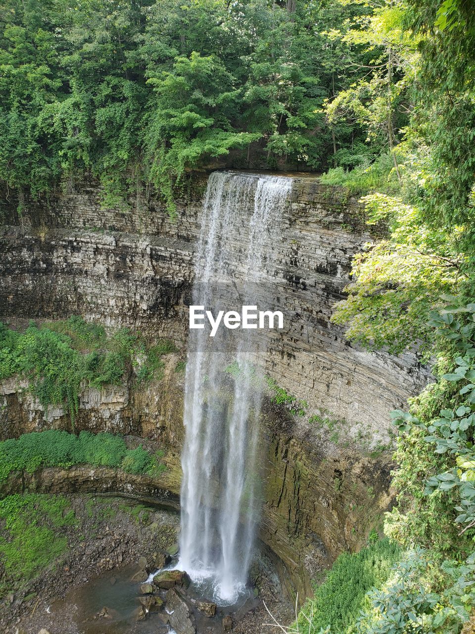 SCENIC VIEW OF WATERFALL