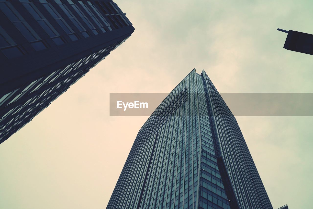 Low angle view of modern building against sky