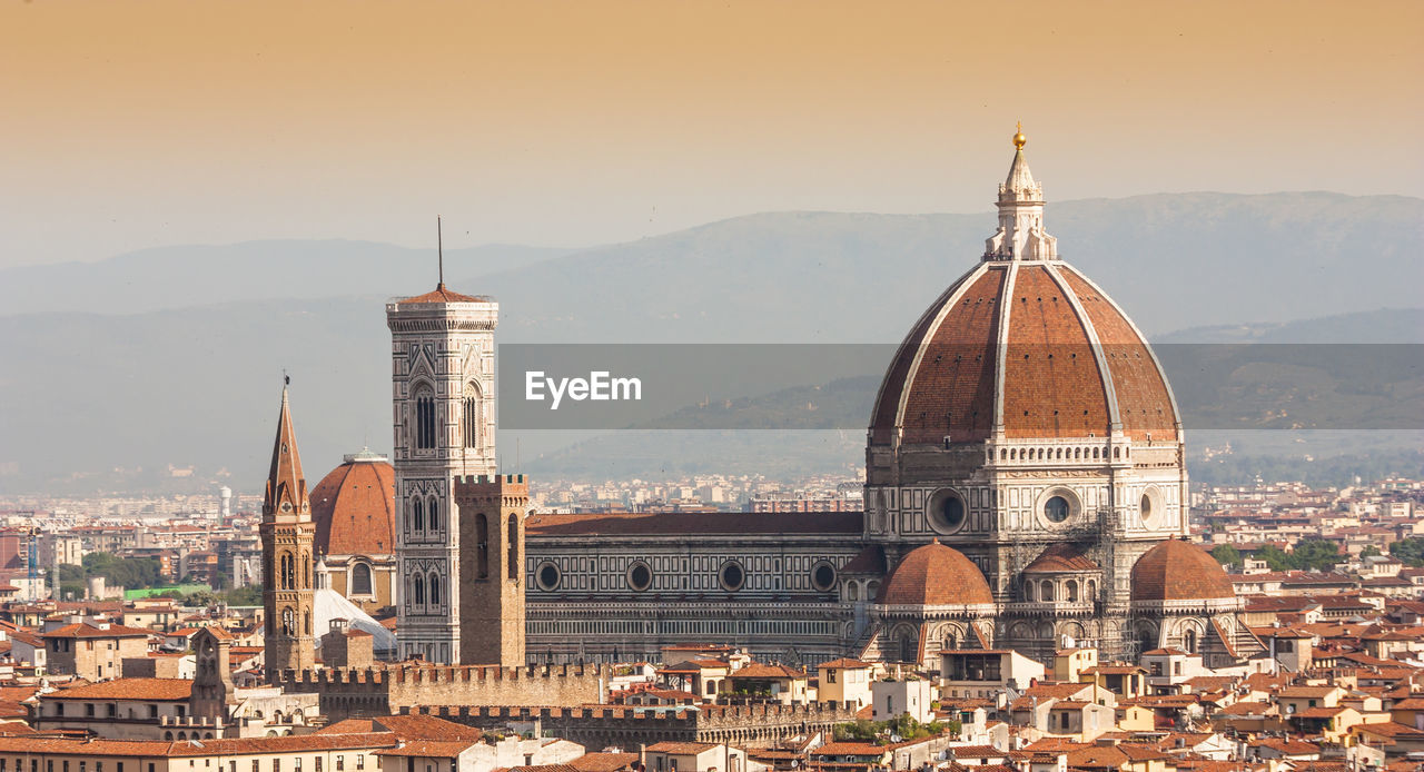 Florence cathedral in city against sky