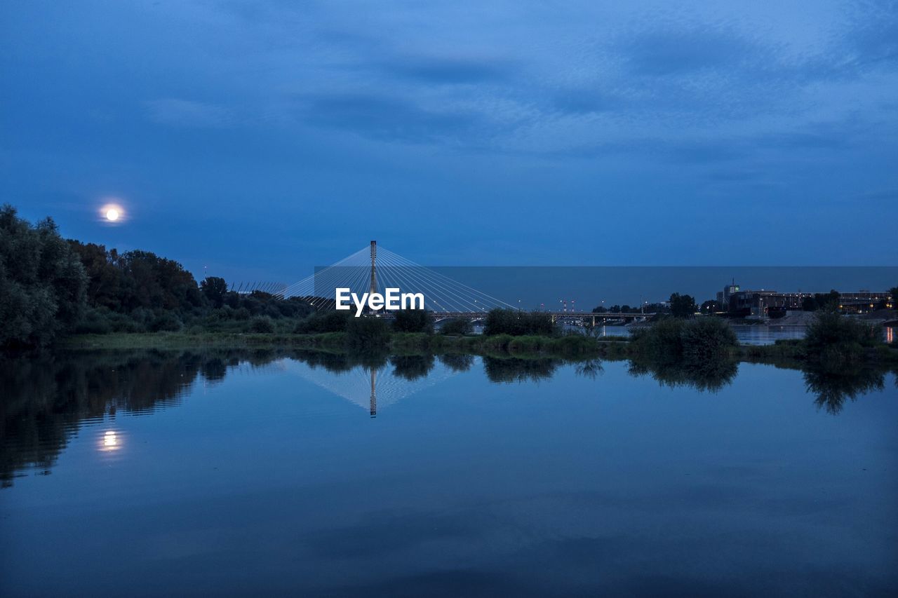 Scenic view of lake against blue sky