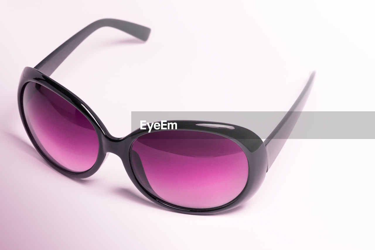 High angle view of sunglasses against white background