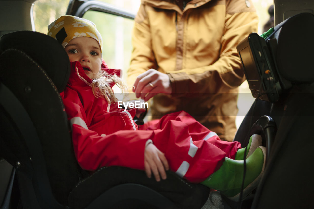 Girl sitting in car