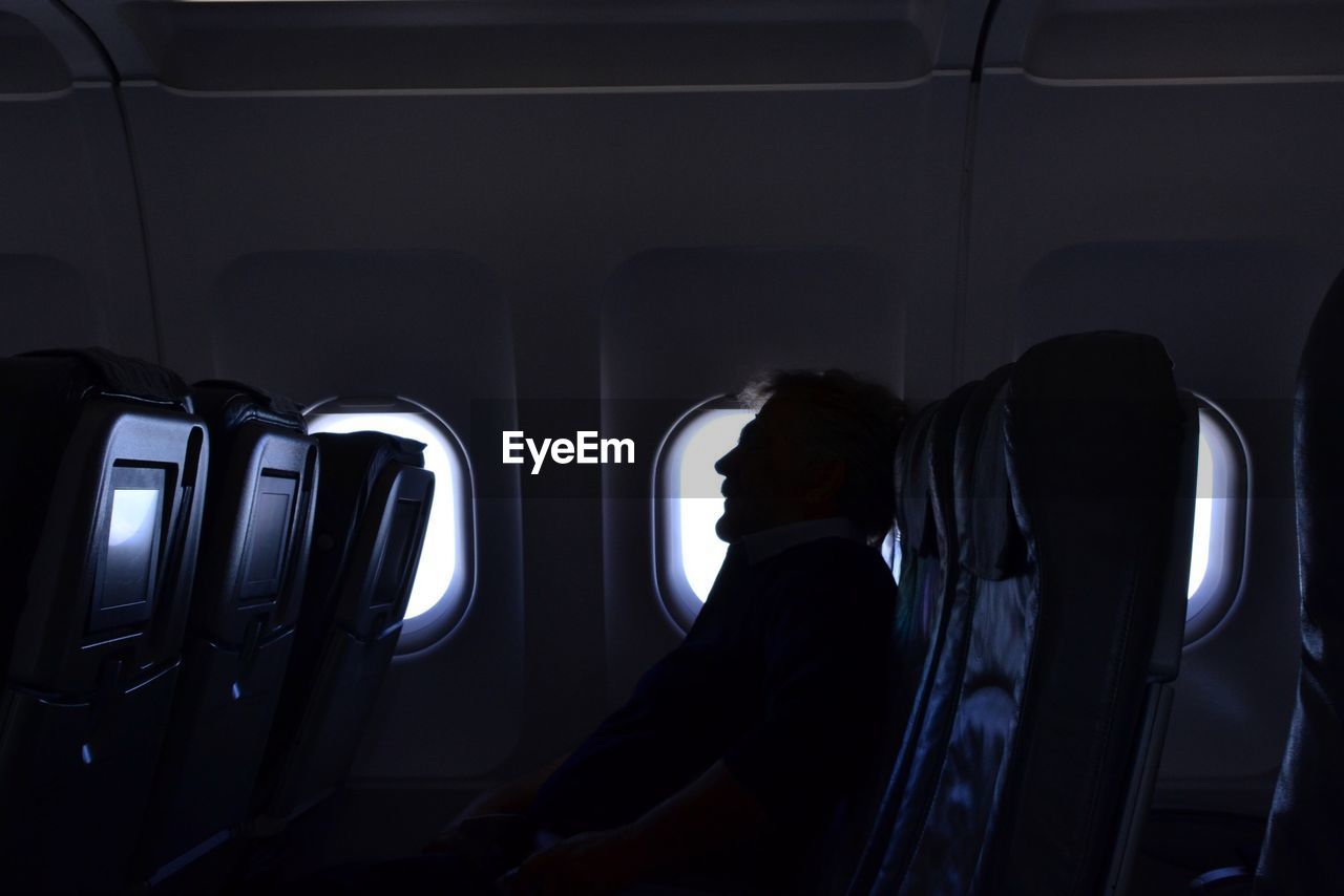 Man sitting in plane