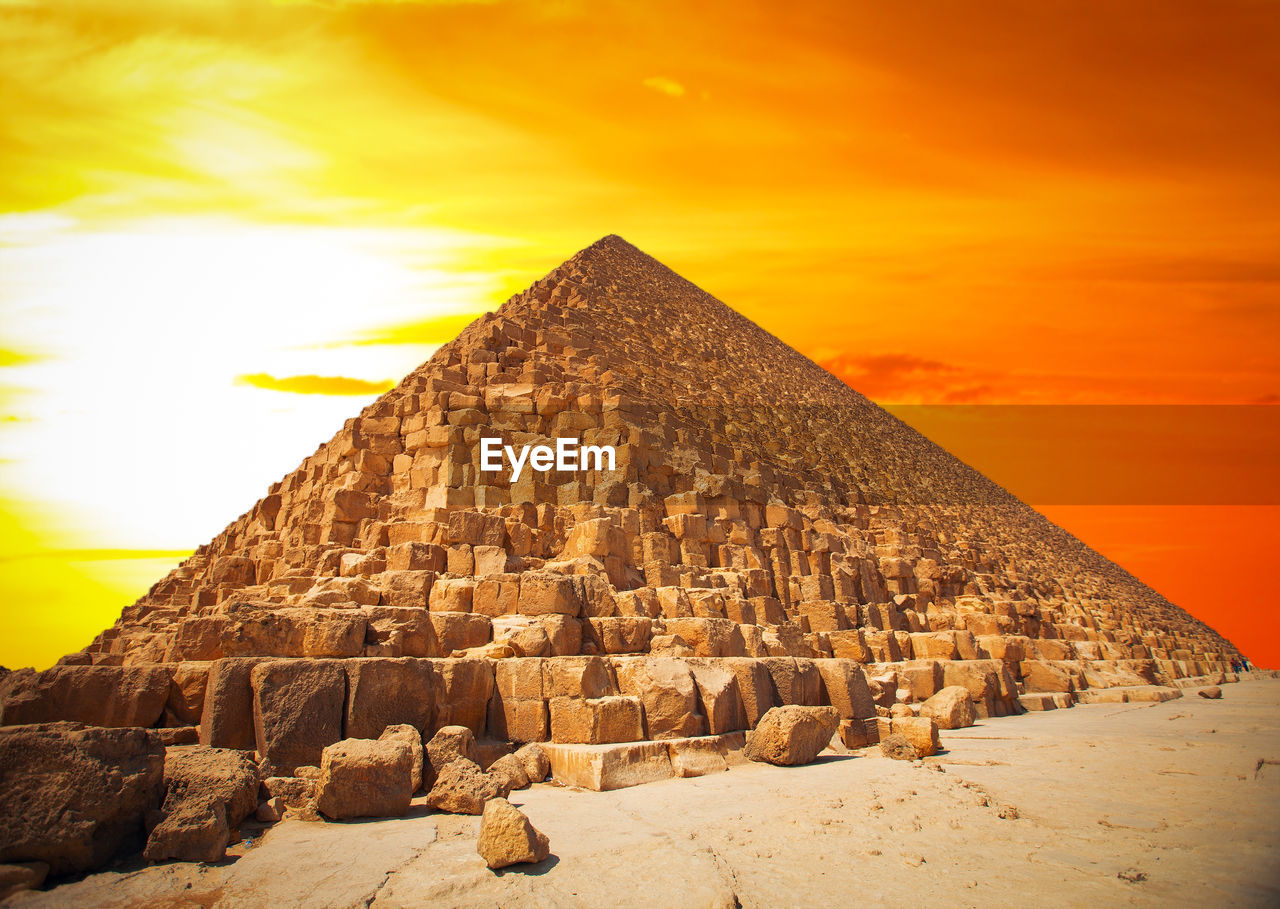  pyramid against sky during sunset