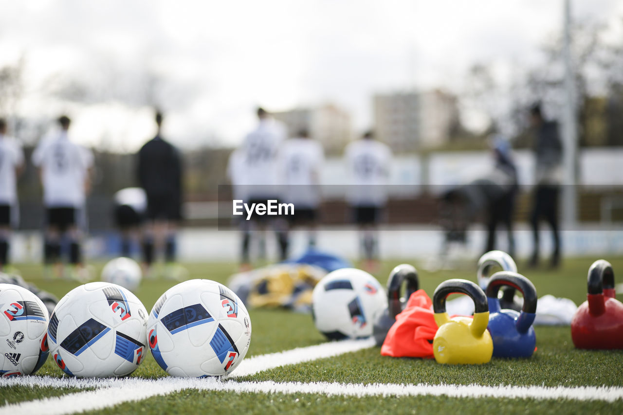 CLOSE-UP OF PLAYING SOCCER BALL