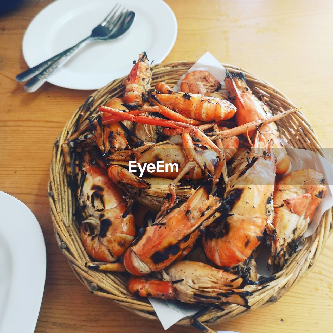 High angle view of seafood in basket on table