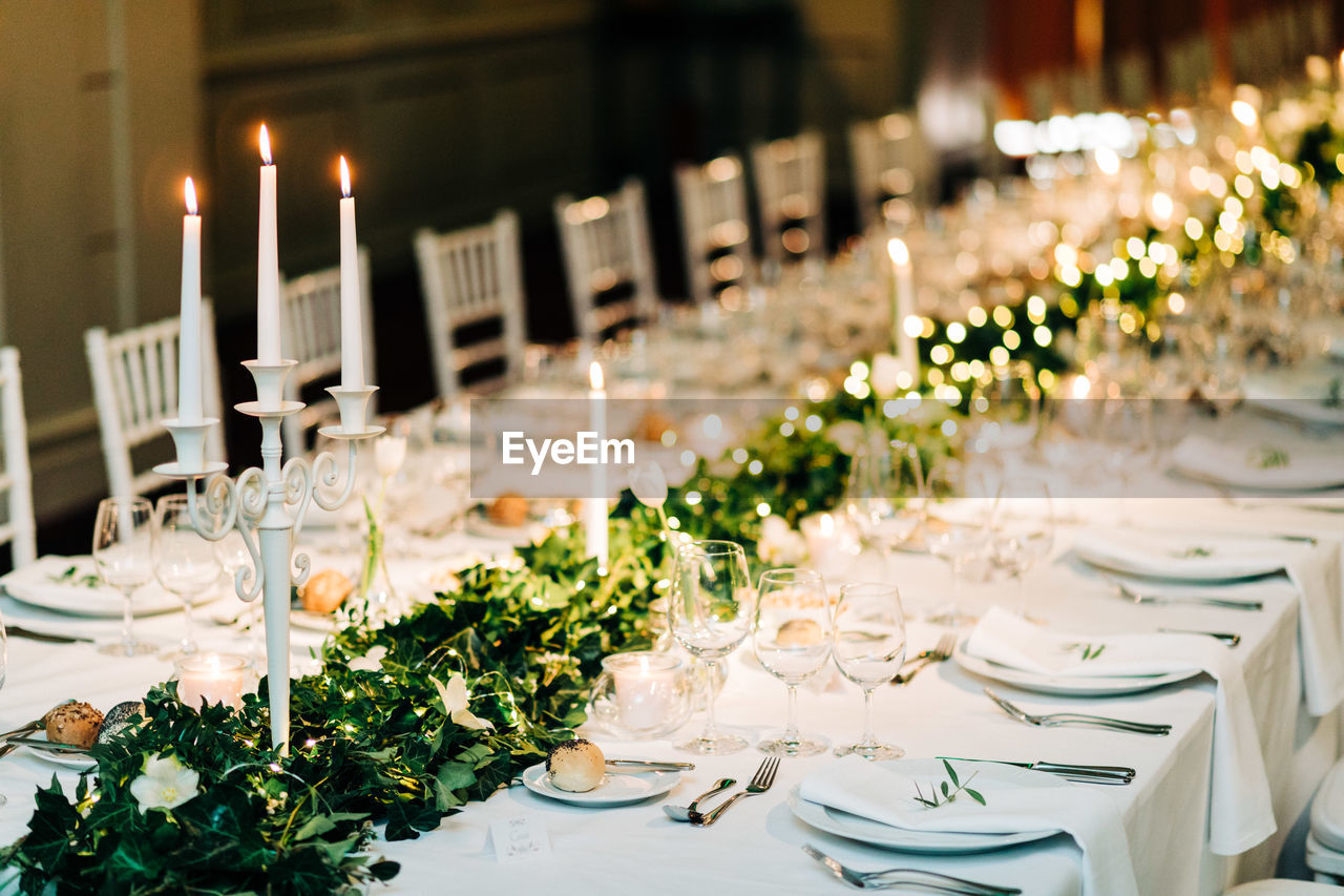 White wedding table setup decoration with lights