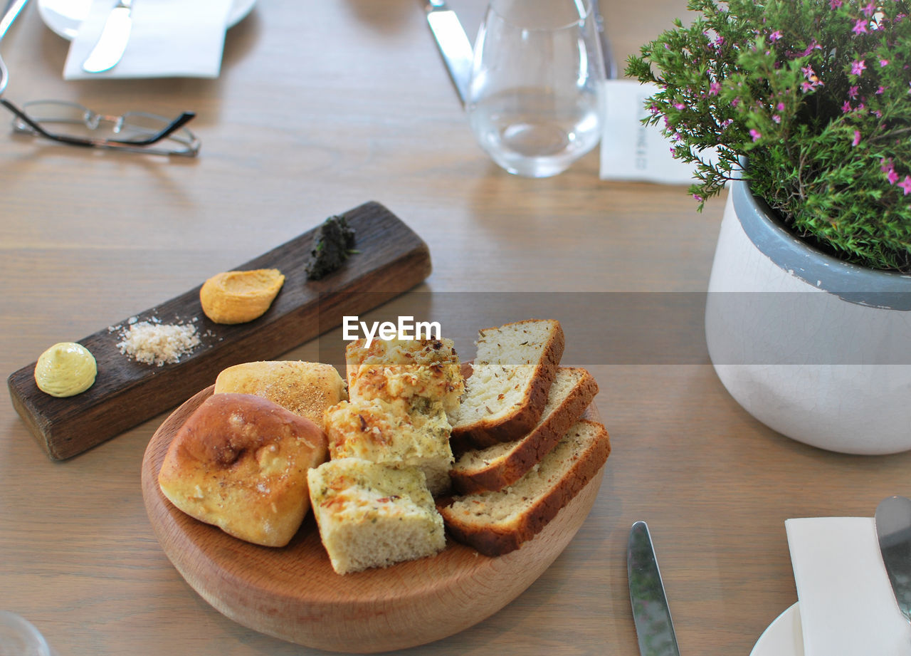 HIGH ANGLE VIEW OF VARIOUS FOOD ON TABLE