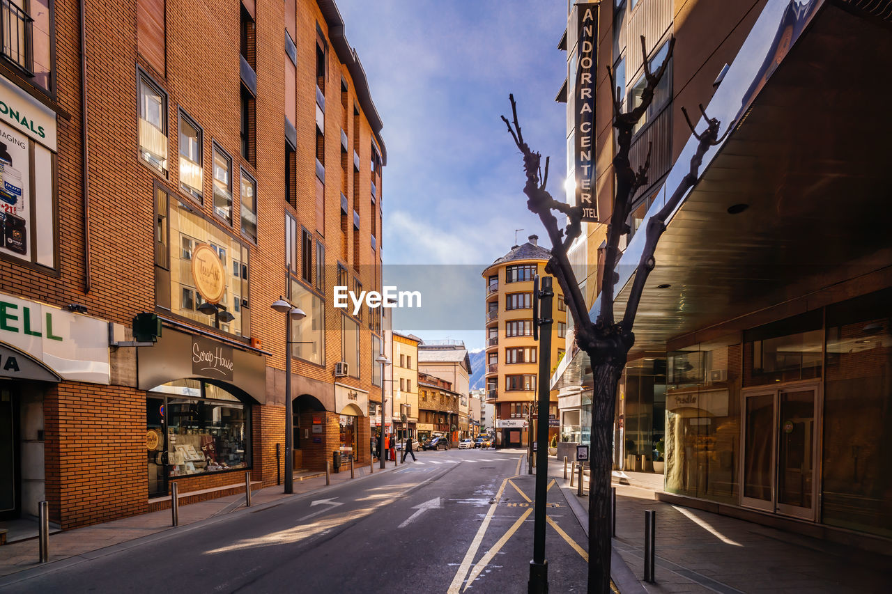 STREET AMIDST BUILDINGS IN CITY