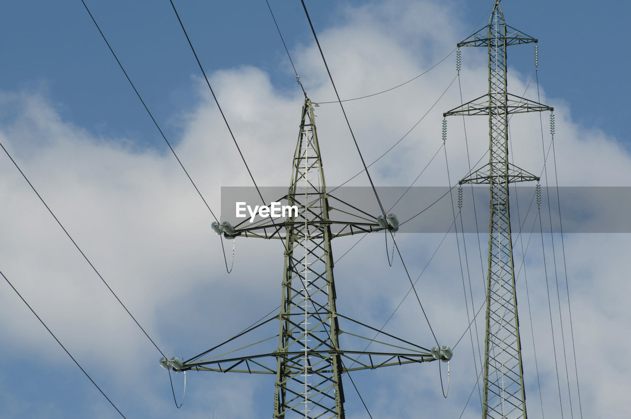 low angle view of electricity pylon