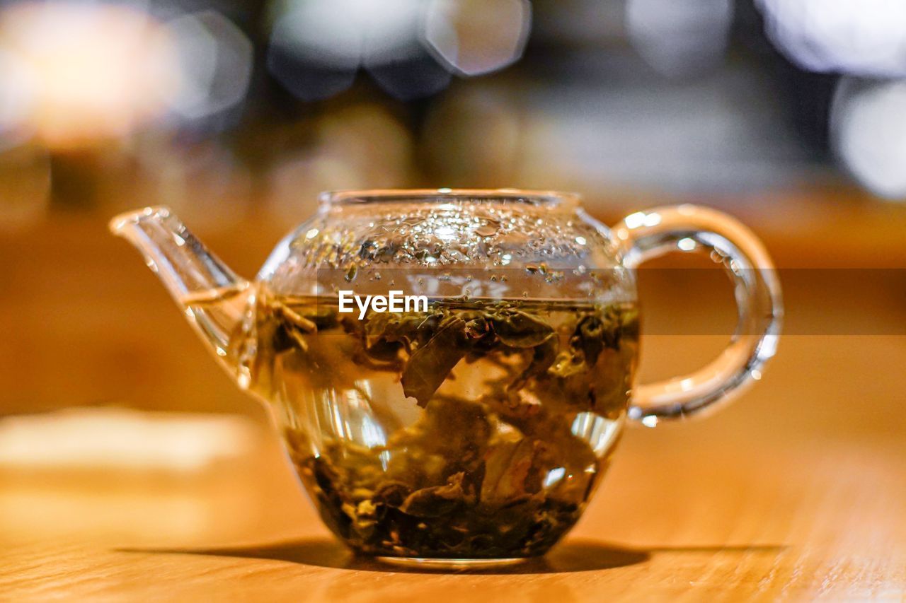 Close-up of tea in glass on table