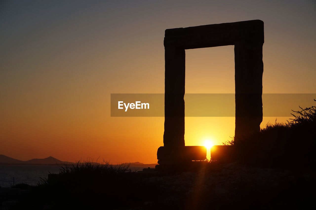 SILHOUETTE OF HISTORICAL BUILDING DURING SUNSET