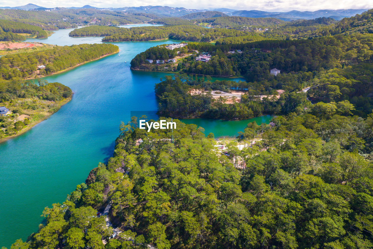 water, scenics - nature, environment, plant, tree, nature, land, landscape, aerial photography, beauty in nature, aerial view, high angle view, no people, travel destinations, travel, lake, tranquility, reservoir, forest, outdoors, green, architecture, mountain, day, tourism, tranquil scene, sky, body of water, non-urban scene, blue, idyllic, beach