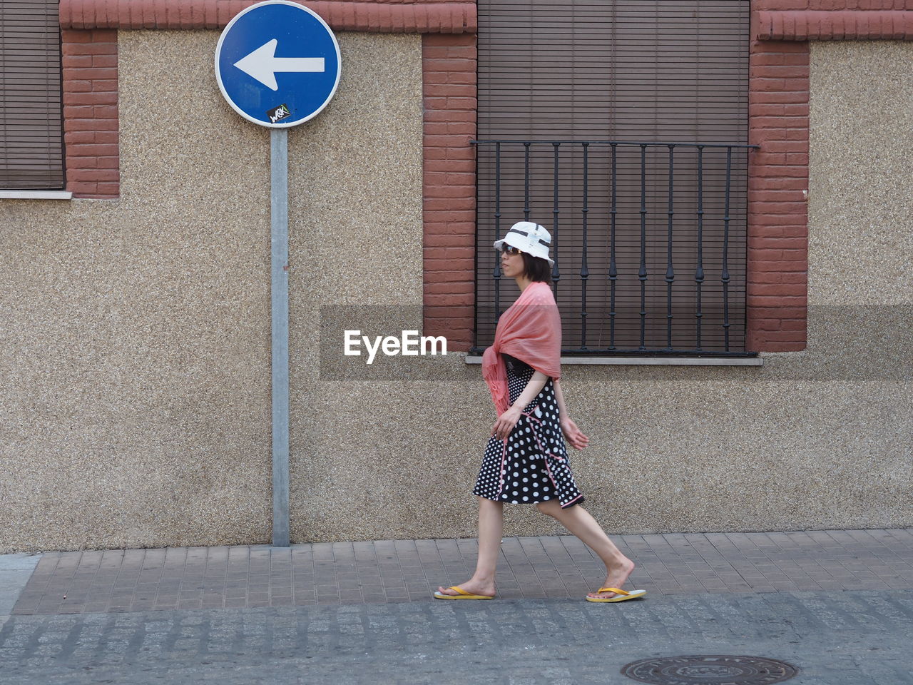 Woman walking on street