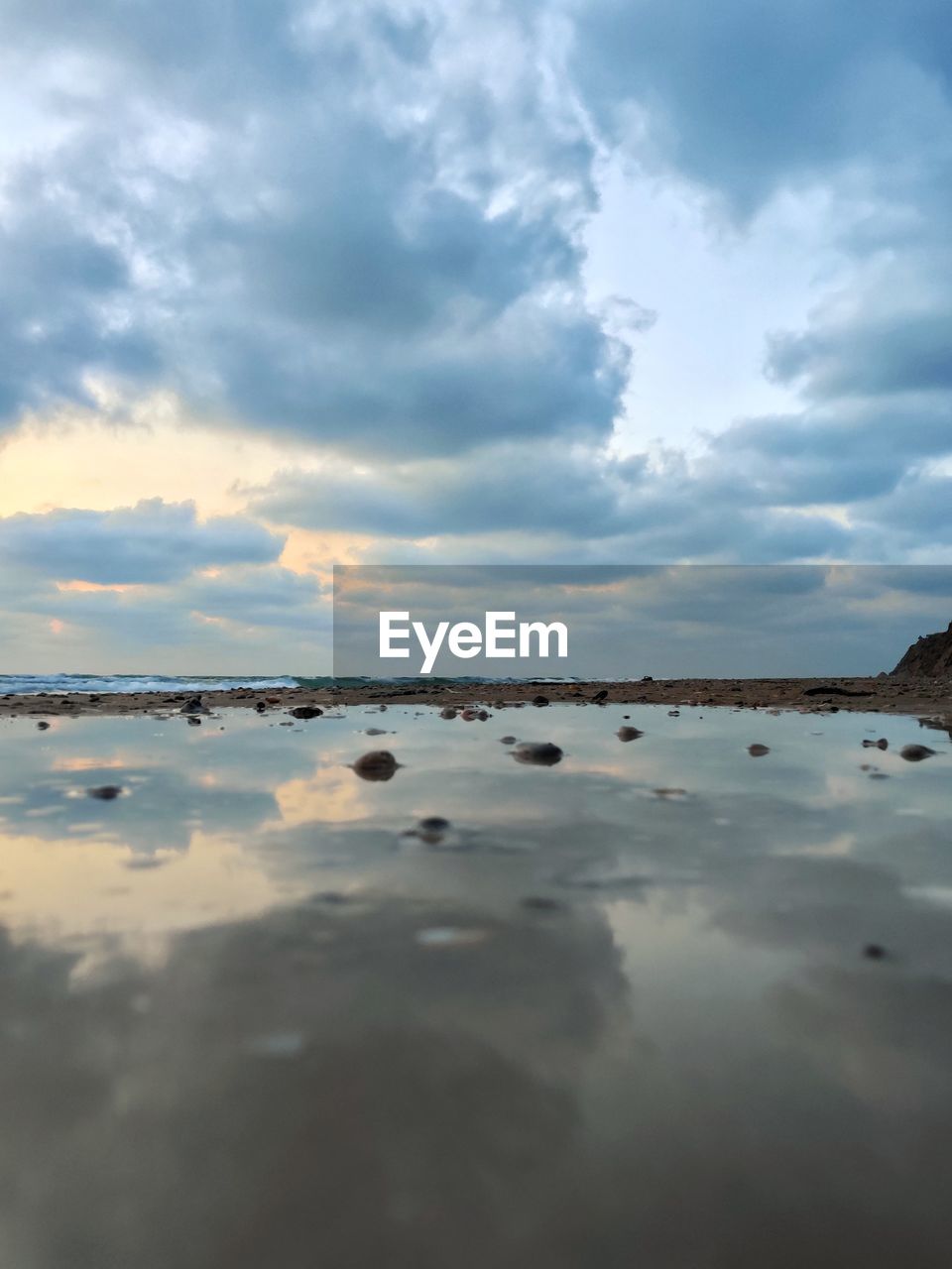 REFLECTION OF CLOUDS IN SEA