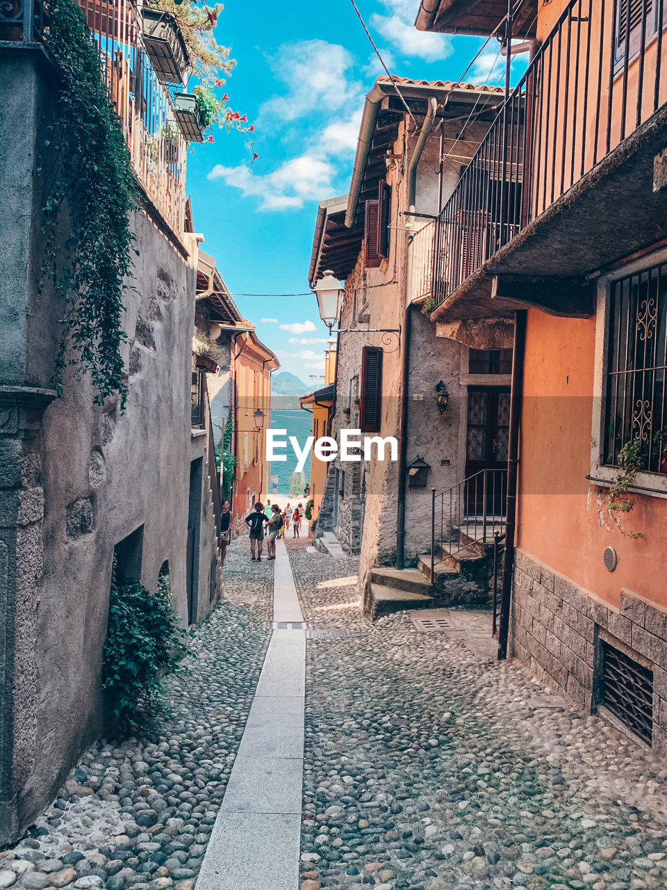 STREET AMIDST BUILDINGS IN CITY