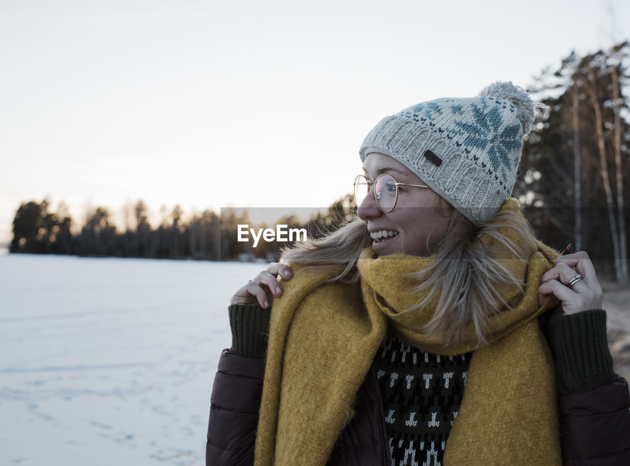 Portrait of a woman wrapped up warm whilst walking in sweden