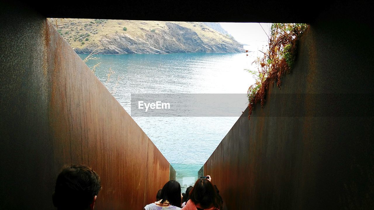 VIEW OF PEOPLE IN WATER