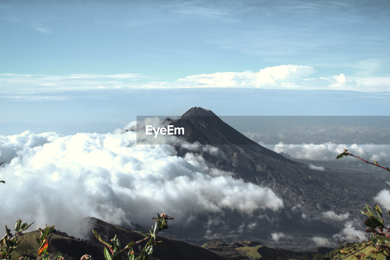 Panoramic view of volcanic landscape against sky