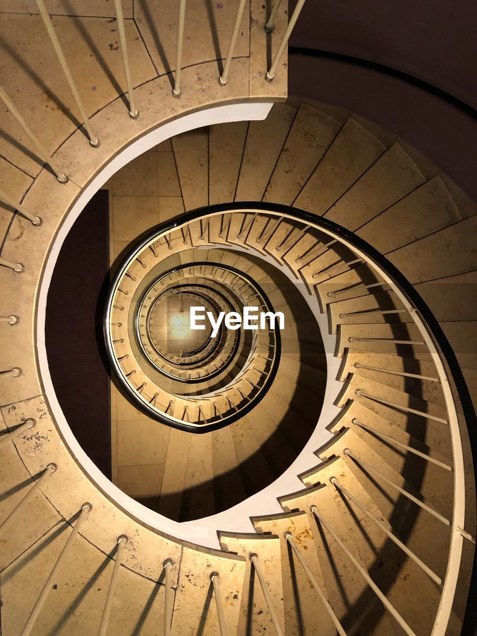 LOW ANGLE VIEW OF SPIRAL STAIRCASE