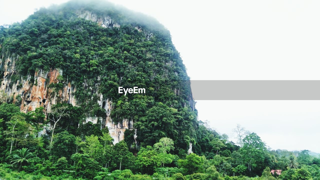 Low angle view of hill against sky 