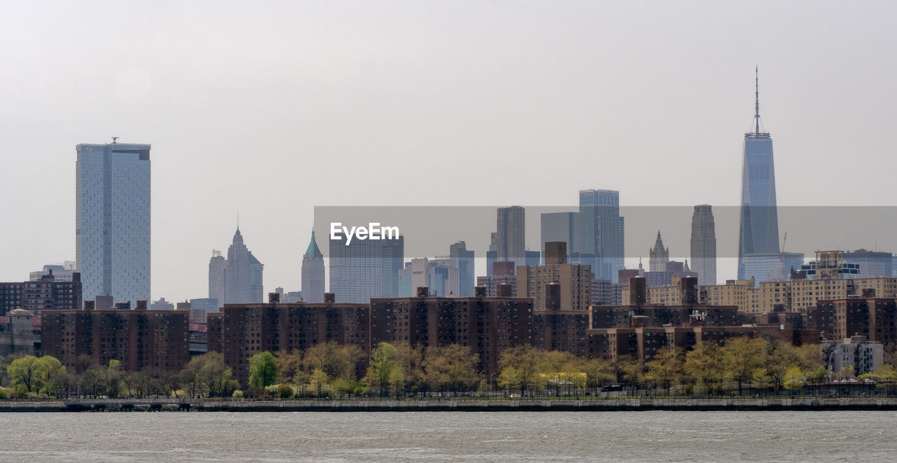 View of buildings in city against sky