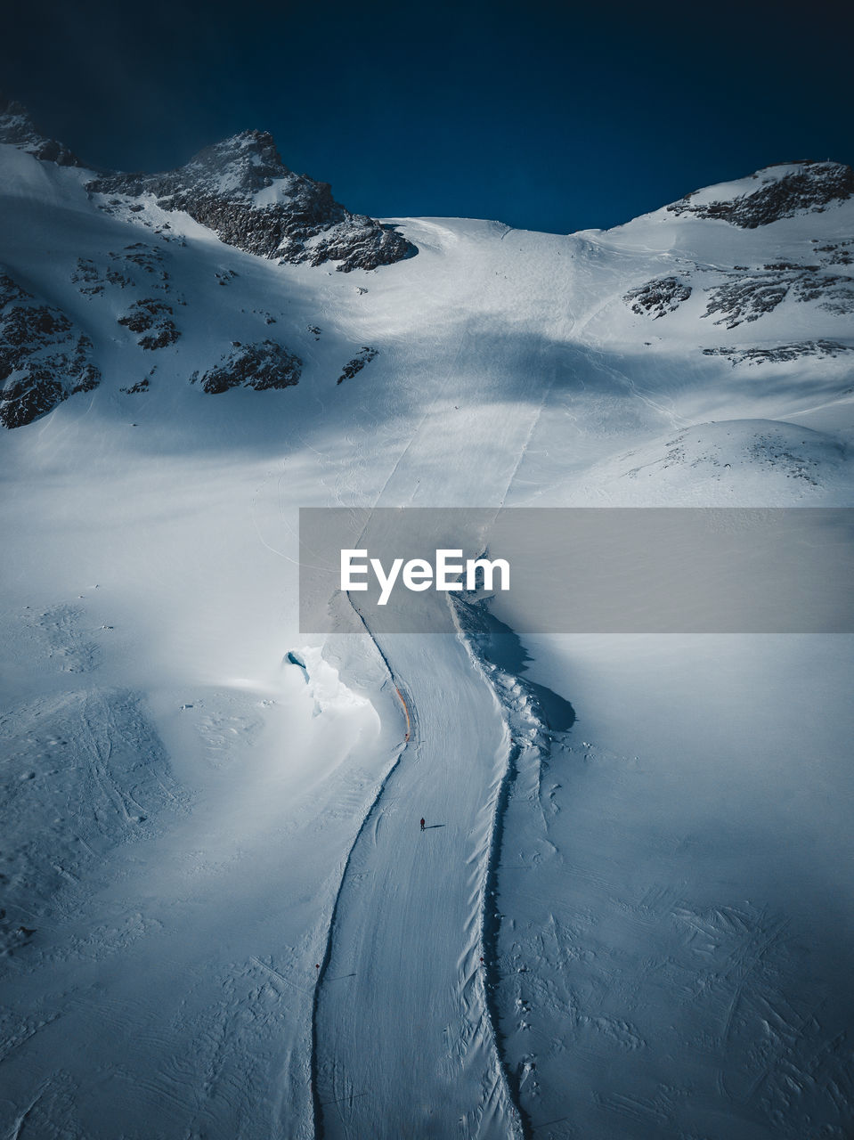 Aerial view of snow covered mountain