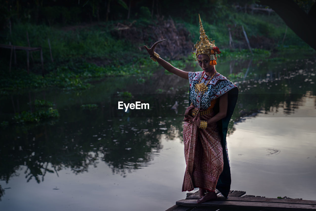 Thai ghost in traditional costume that appear in history, portrait of asian woman make up ghost face