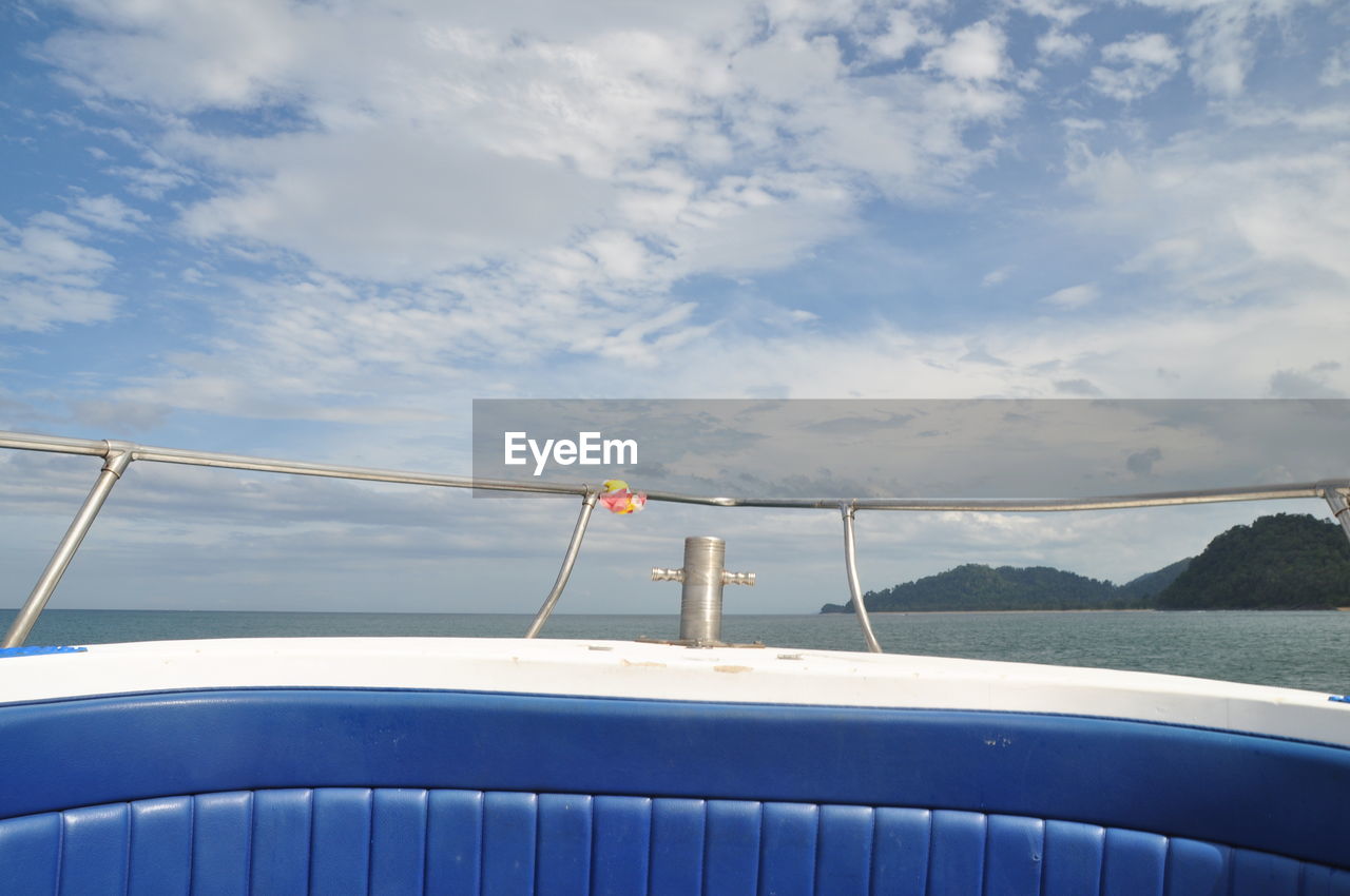 CLOSE-UP OF SHIP AGAINST SKY