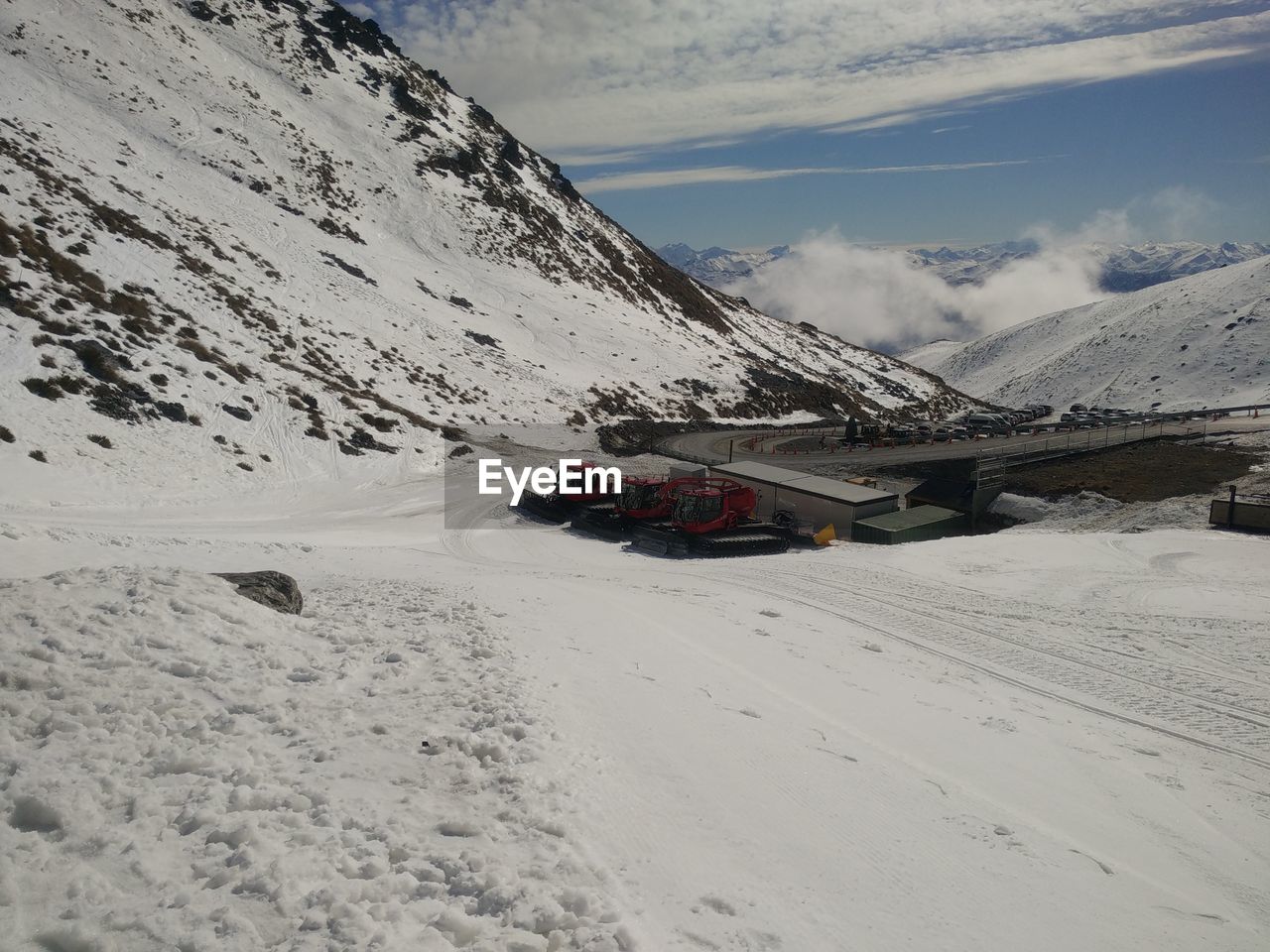 Scenic view of mountains against sky during winter