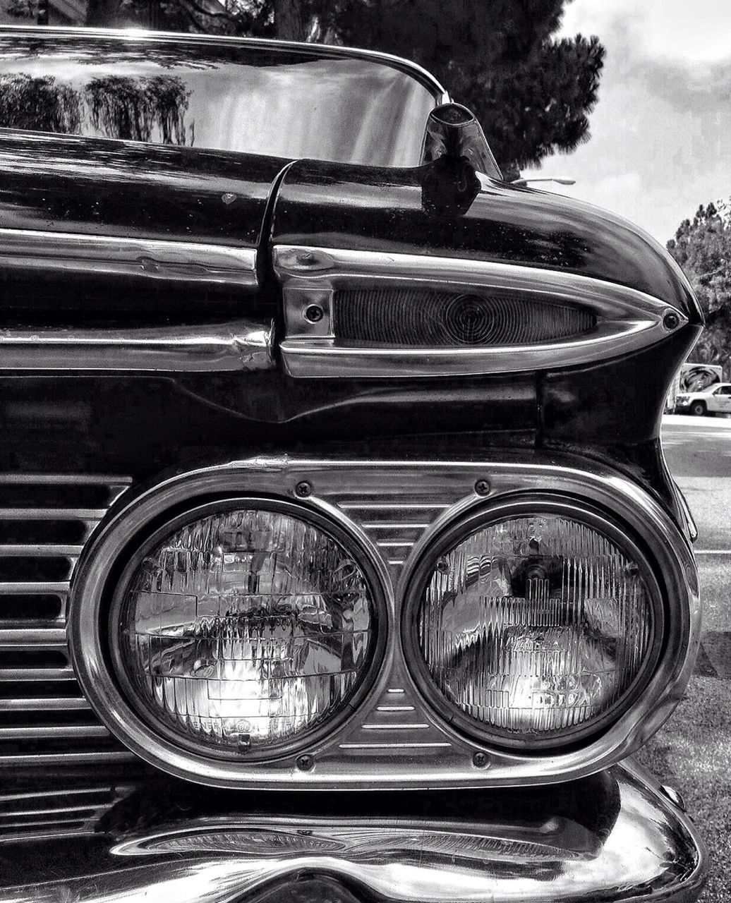 VINTAGE CAR ON ROAD