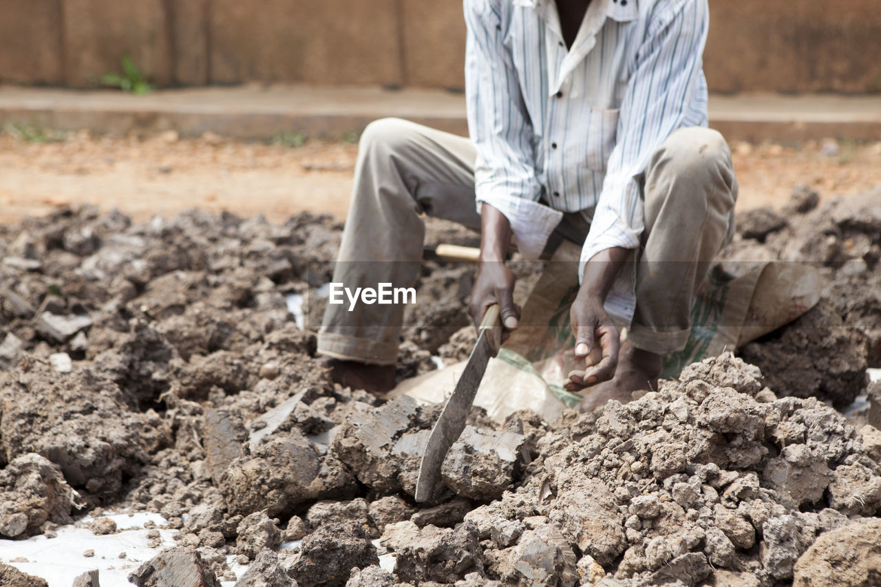 Man working on ground