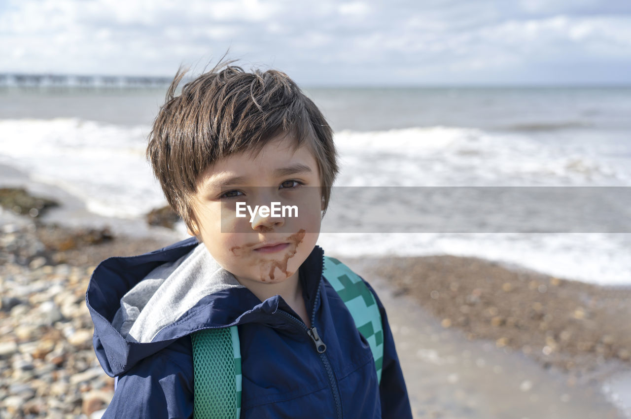 Portrait of cute boy on beach