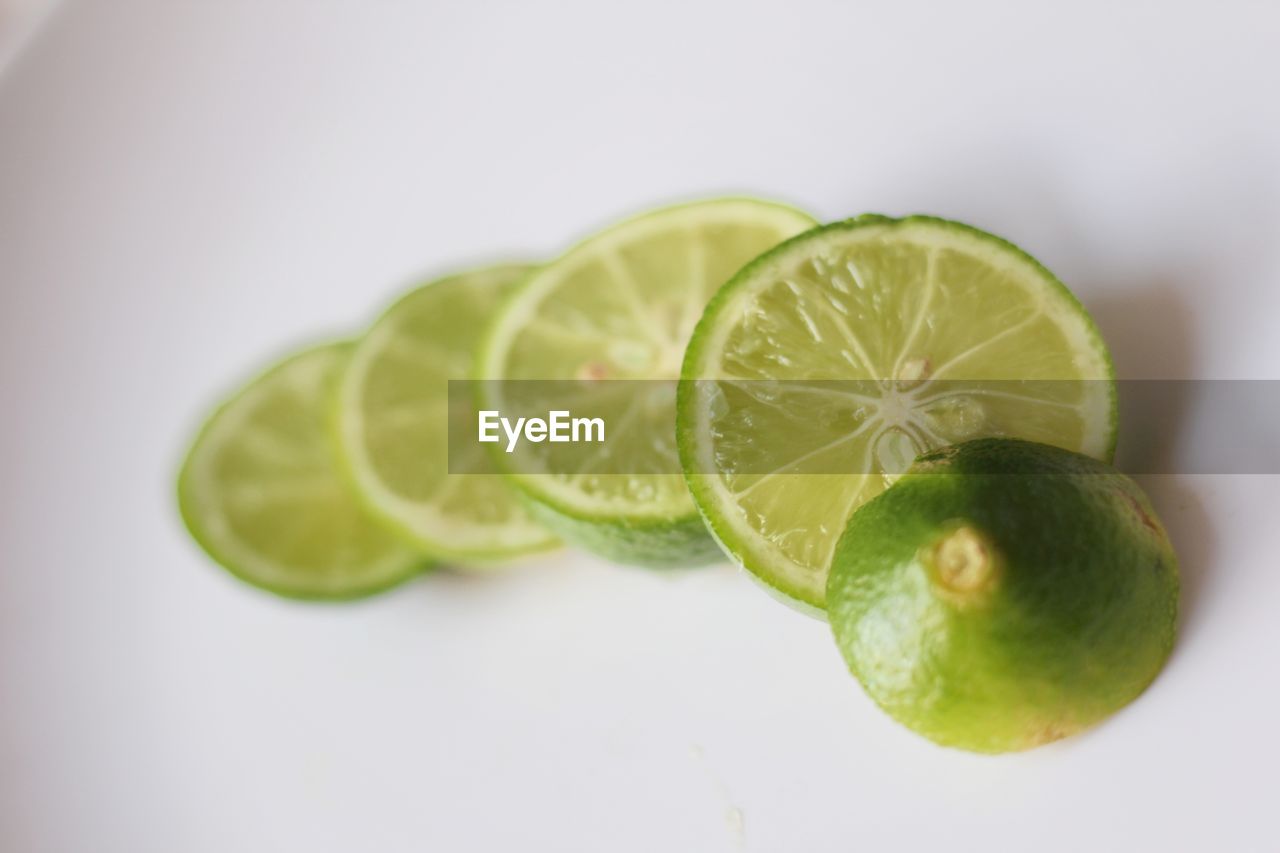 CLOSE-UP OF GREEN FRUIT