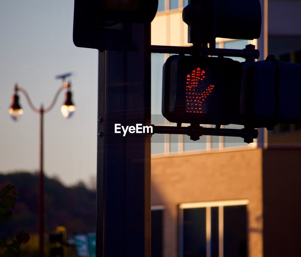 CLOSE-UP OF ILLUMINATED STREET LIGHT