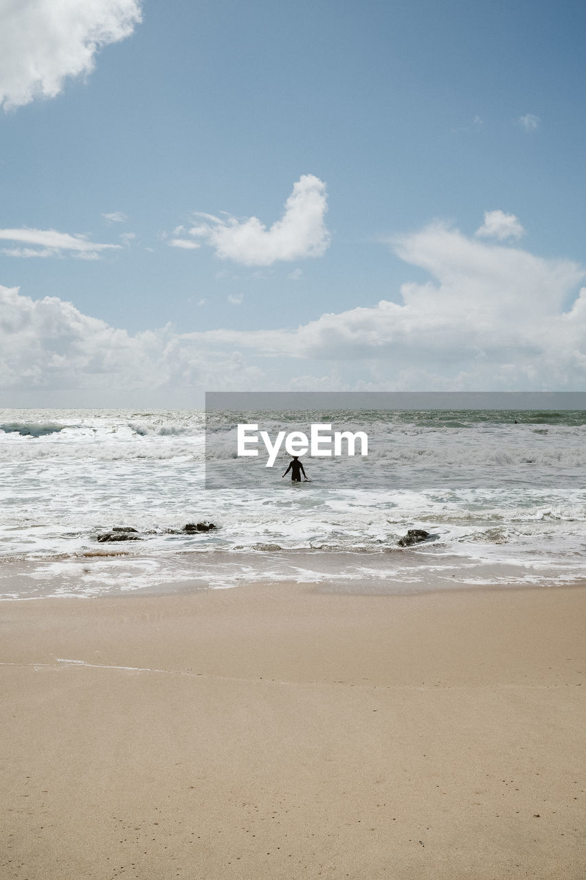 VIEW OF BEACH AGAINST SKY