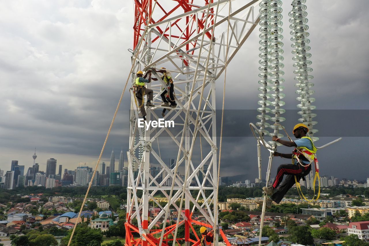 Ferris wheel against sky in city