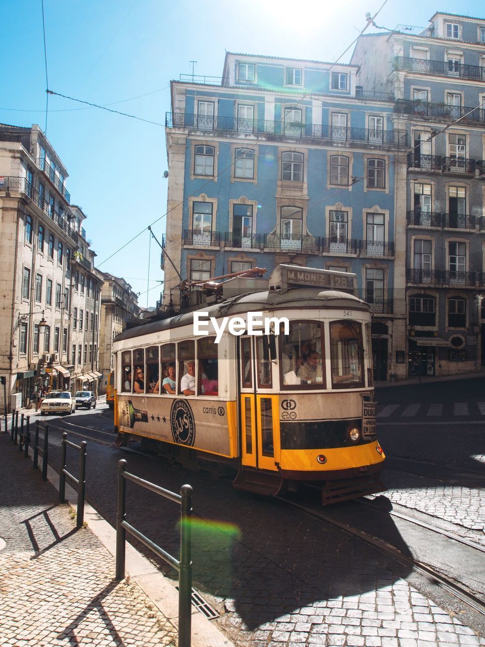 Tram on city street