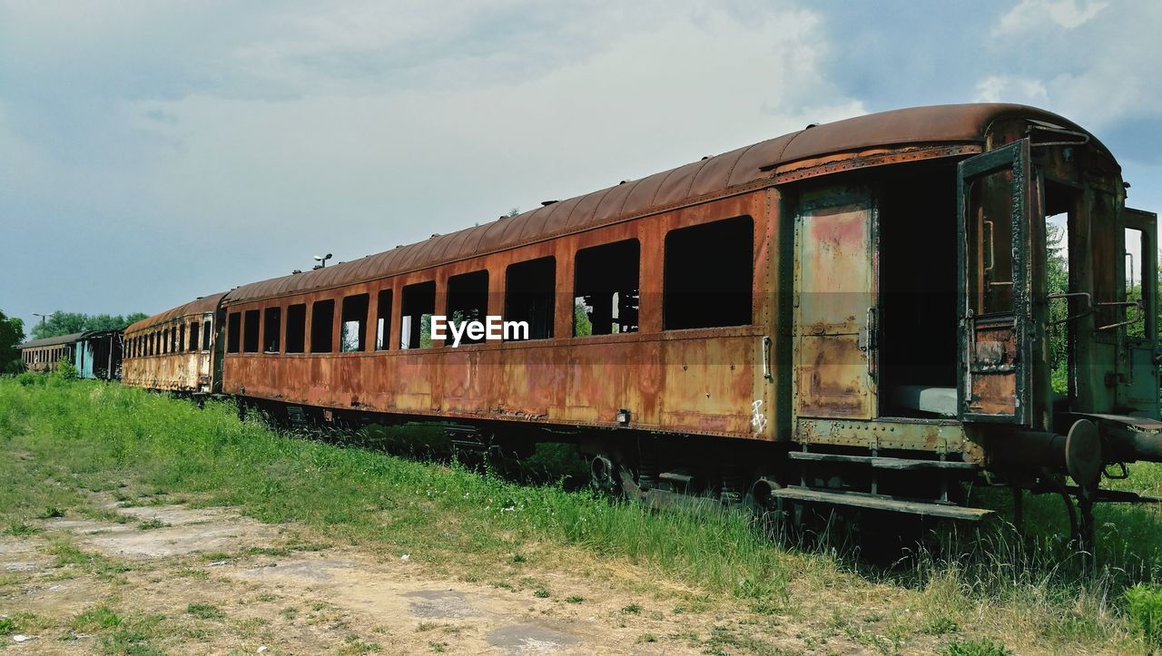 Abandoned train against sky