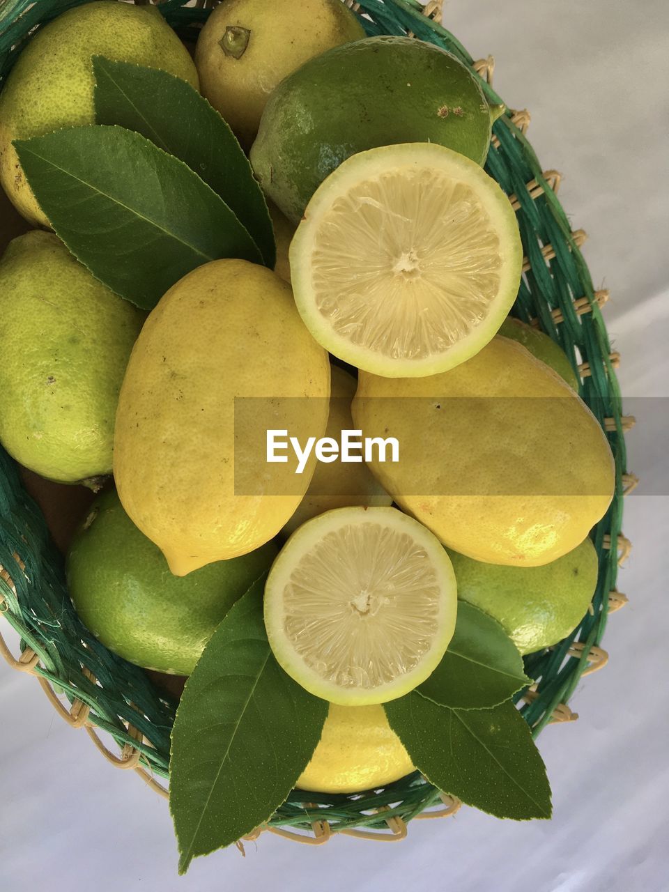 A basket of freshly picked lemons