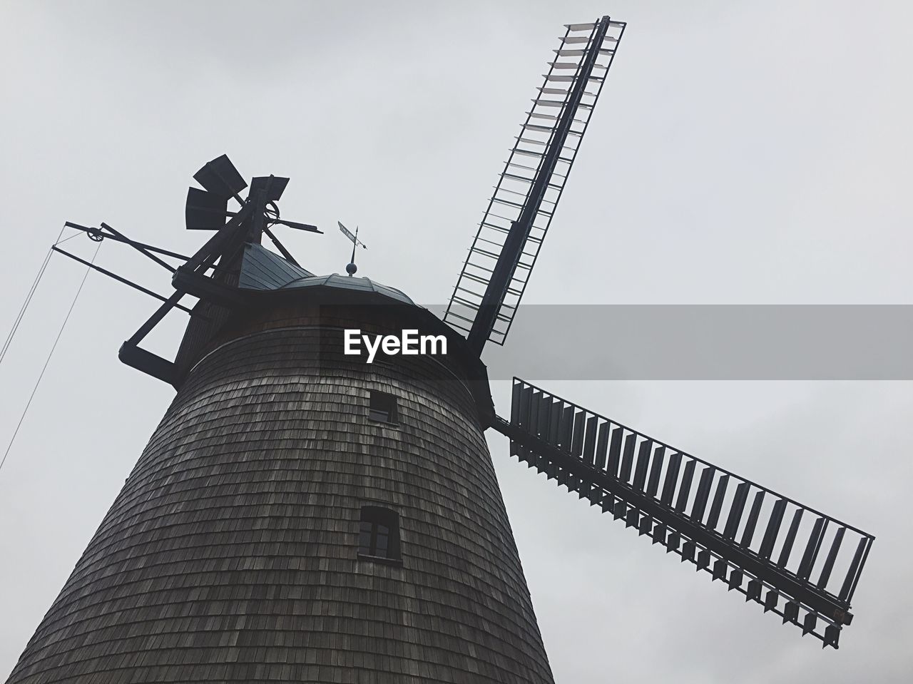 Low angle view of windmill against clear sky