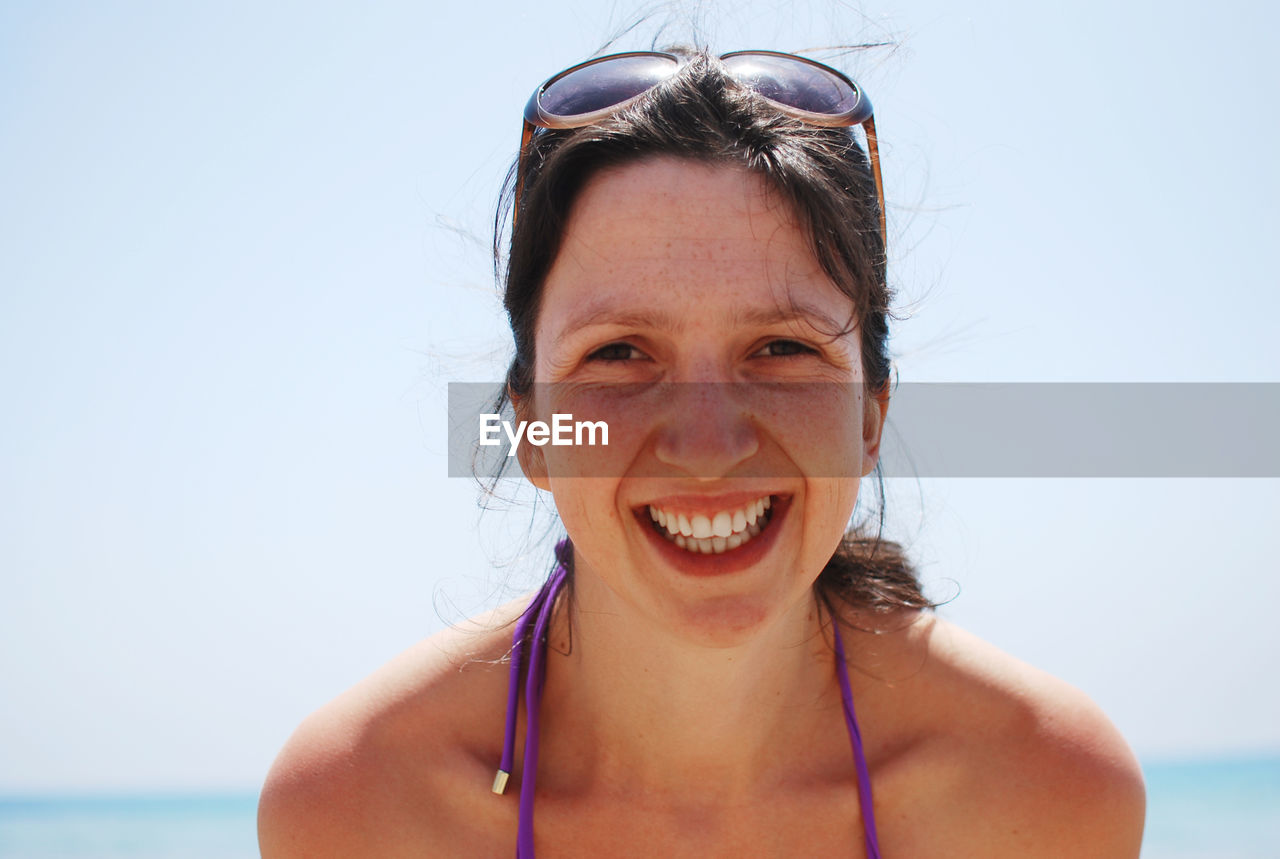 Close-up of young smiling woman