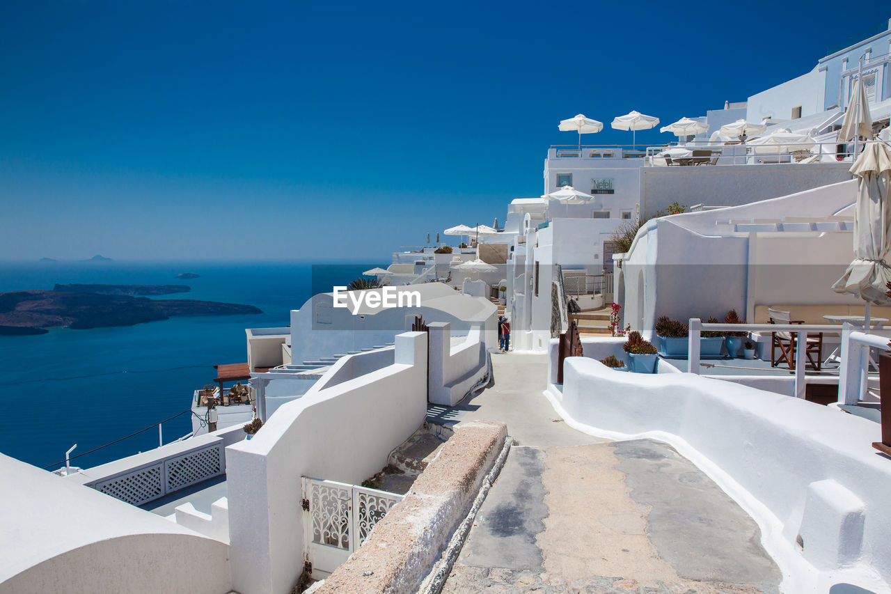 Beautiful alleys of fira city at the santorini island in a beautiful early spring day