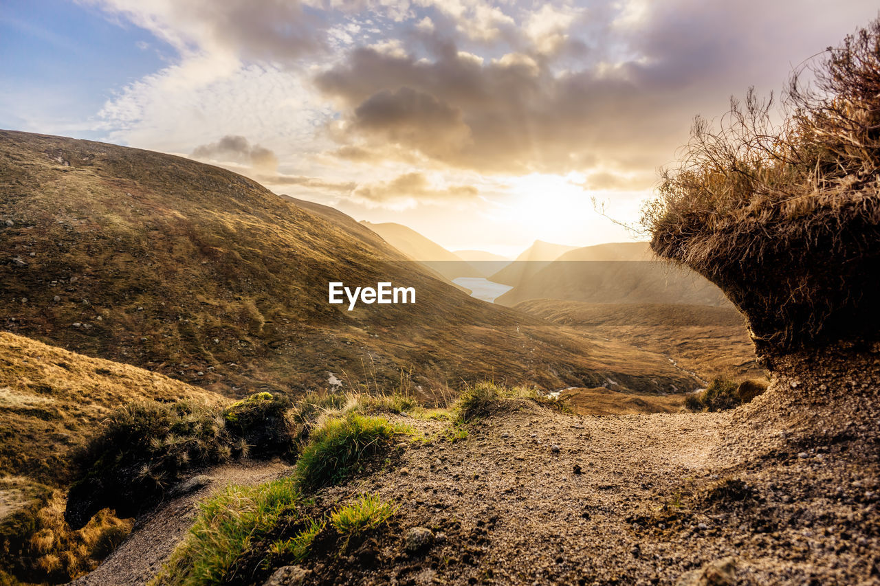 SCENIC VIEW OF LANDSCAPE DURING SUNSET