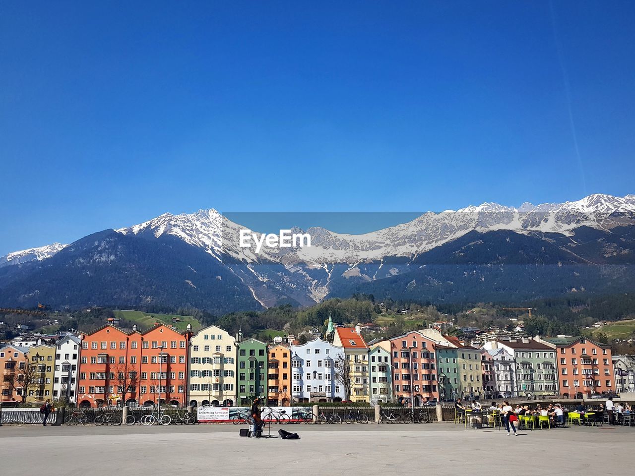 Scenic view of snow mountains against clear blue sky