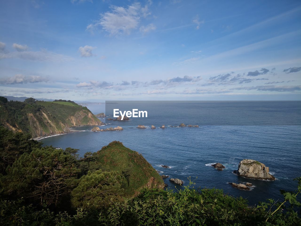 High angle view of bay against sky